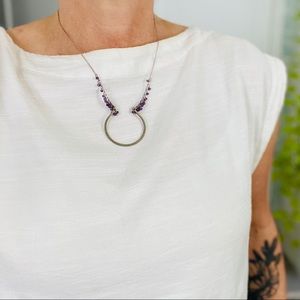 Artisan necklace with silver chain, purple beads
